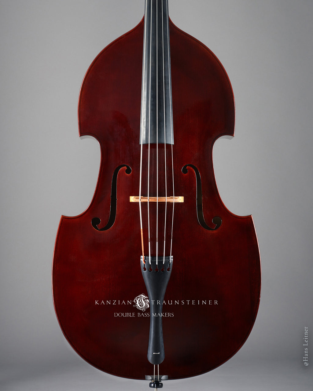 front close up of 5 strings Kanzian & Traunsteiner Viennese Model with red varnish made in 2016