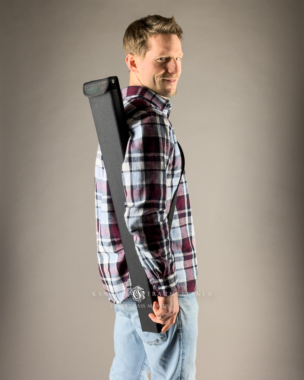 Model carries Simple double bass bow case