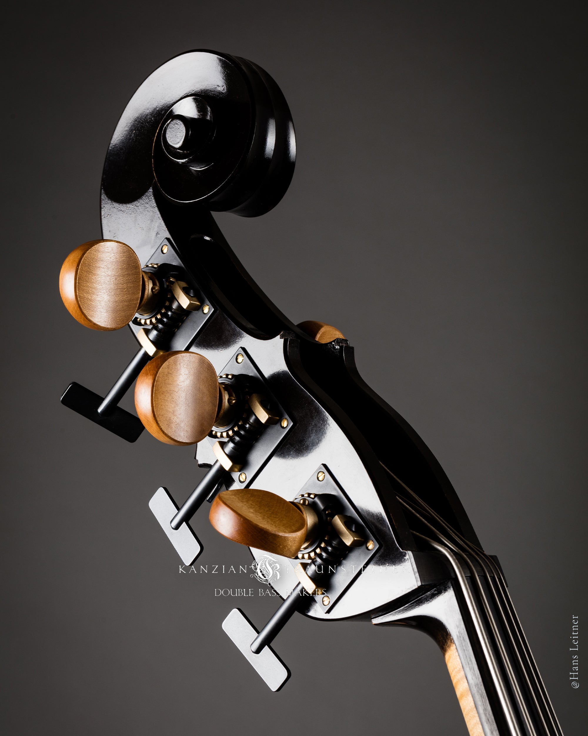 Front oblique view of scroll and tuners for 2017 Kanzian & Traunsteiner Black Double Bass