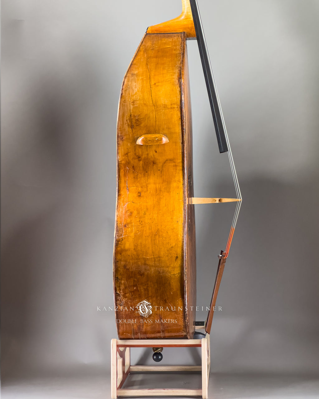 Pear shaped Italian Double bass labeled Rotella right side view