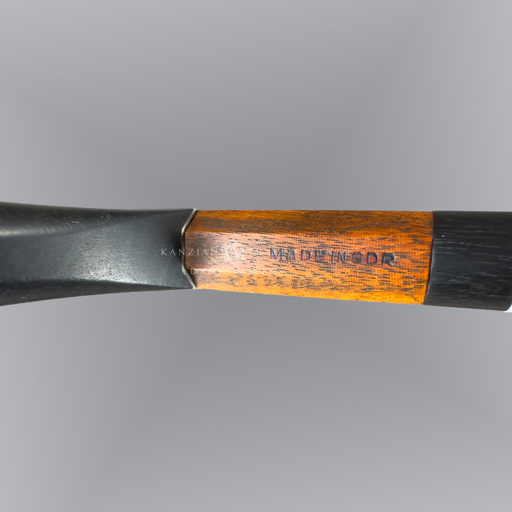 Stamp feature of German double bass bow HR Pfretzschner GDR 