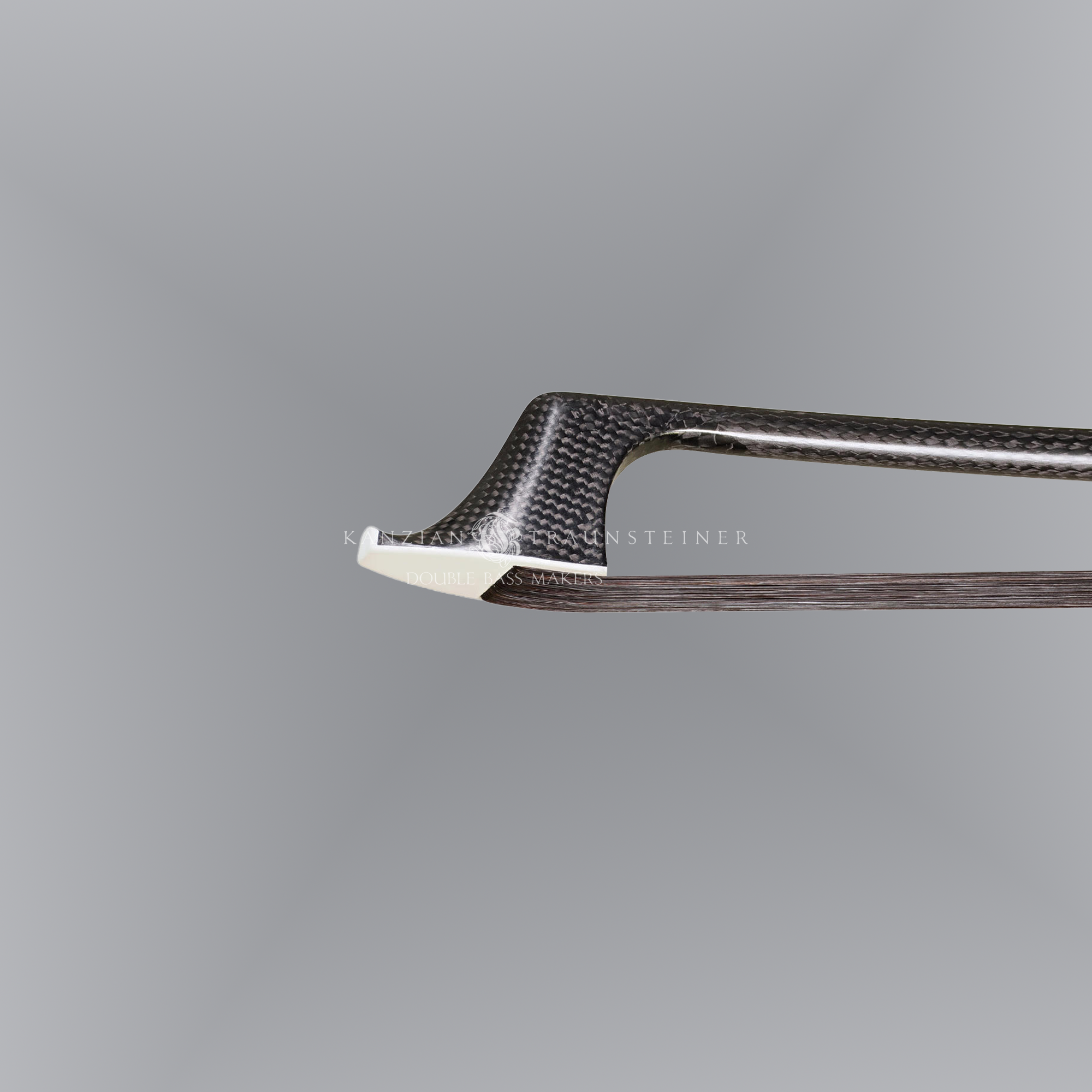 Tip of Müsing Double Bass bows in carbon fibre
